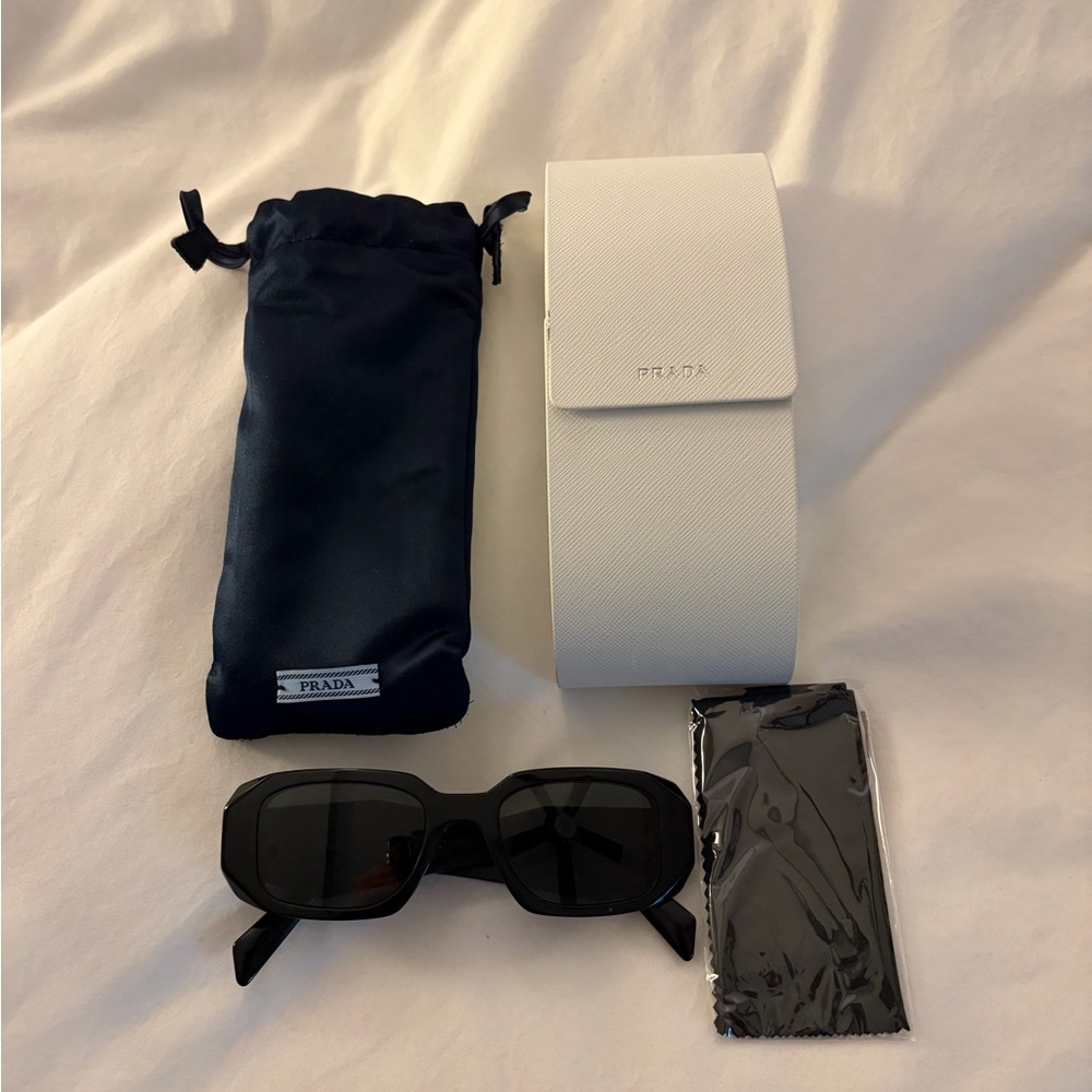 Prada Elegant Black Sunglasses with Case